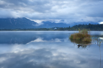 clouded sky over Barmsee lake