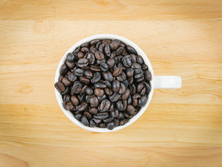 top coffee beans in white cup