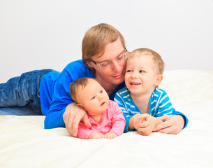 father enjoying time together with kids