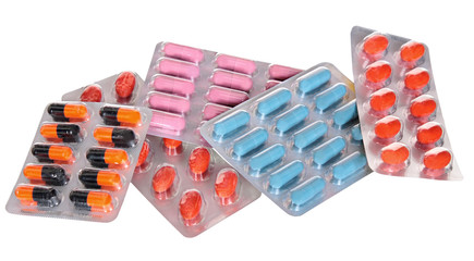 various medicines, pills and syringes on a white background with