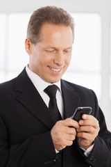 Businessman with mobile phone.