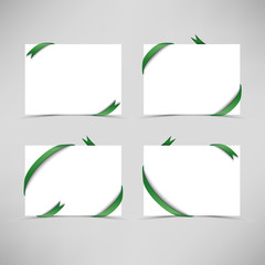 White card with green ribbons