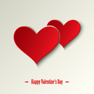 Valentine card with red hearts on a light background