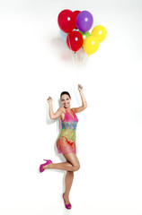 Fototapeta na wymiar Fashion woman with ballons