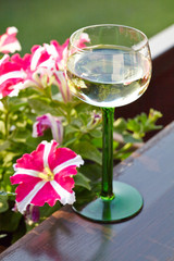 Wine glass with beautiful flowers