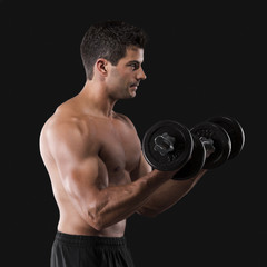 Fototapeta na wymiar Muscular man lifting weights