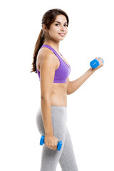 Athletic woman lifting weights