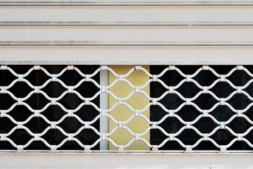 Pattern metal grille gate close-up.