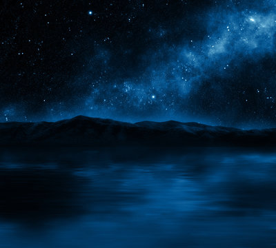 Mountain lake with stars