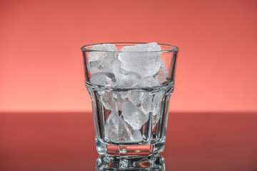 A glass with ice cubes 