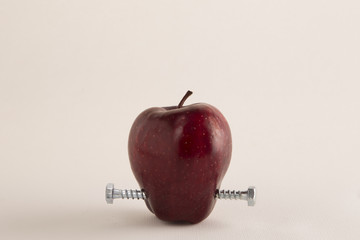 GMO frankenfood:  apple with bolts