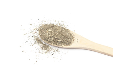 Dried estragon spice and wooden spoon
