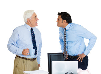 Conflict at work. Business men, generations. Subordination