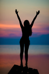 Silhouette of slim woman