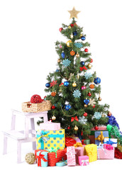 Decorated Christmas tree with gifts isolated on white
