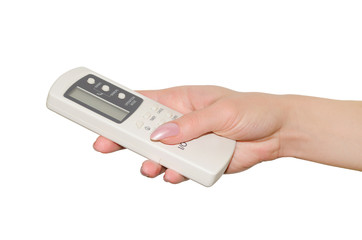 Remote control for air conditioner in a female hand.
