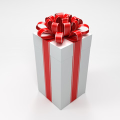 White gift box with red ribbon