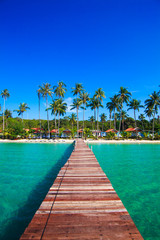 Tropical Resort.  boardwalk on beach - obrazy, fototapety, plakaty