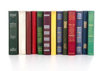 Pile of books isolated on white background.