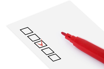 Checklist and red pencil closeup