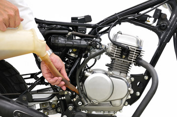 Obraz premium バイクのエンジンオイル交換