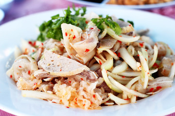 Thai food Pig ears and pork sausage salad