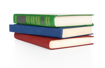 Pile of books isolated on white background.