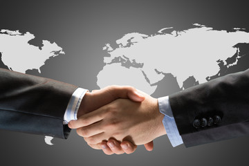 Two businessmen shaking hands