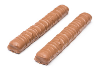 Long Milk Chocolate Bars With Caramel Filling On White