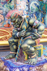 Giant statues are decorated with mosaics