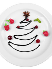 Christmas tree from chocolate on plate close-up