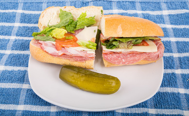 Italian Sub Sandwich with Pickle on Plate