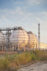 big Industrial oil tanks in a refinery