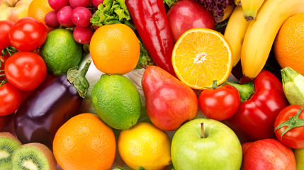 Fototapeta na wymiar bright background of ripe fruits and vegetables