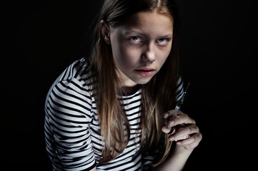 Teenager girl with a cigarette