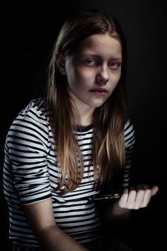 Teenager girl with a cigarette