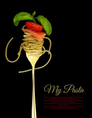 Fork with spaghetti, tomato, salmon and basil on black