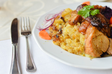 Fried pork or piglet served with roasted potatoes