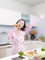 asian housewife in kitchen