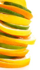Fototapeta na wymiar Orange lime and lemon close up isolated on white