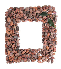 Cocoa beans with leaves isolated on white
