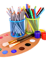 Composition of various creative tools isolated on white