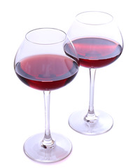 Wineglasses with red wine, isolated on white