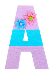 Letter A created with brightly colored knitting yard isolated