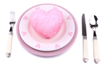 Heart on plate, isolated on white