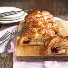 Cheese and strawberry strudel. Selective focus