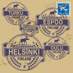 Grunge rubber stamp set with names of Finland cities