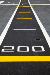 Obraz premium Small runway on the deck of aircraft carrier
