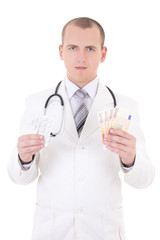 young handsome doctor with package of pills and euro banknotes i