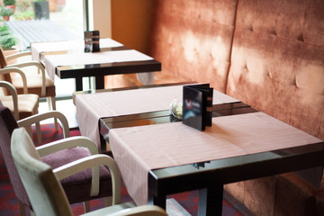 restaurant tables by the window